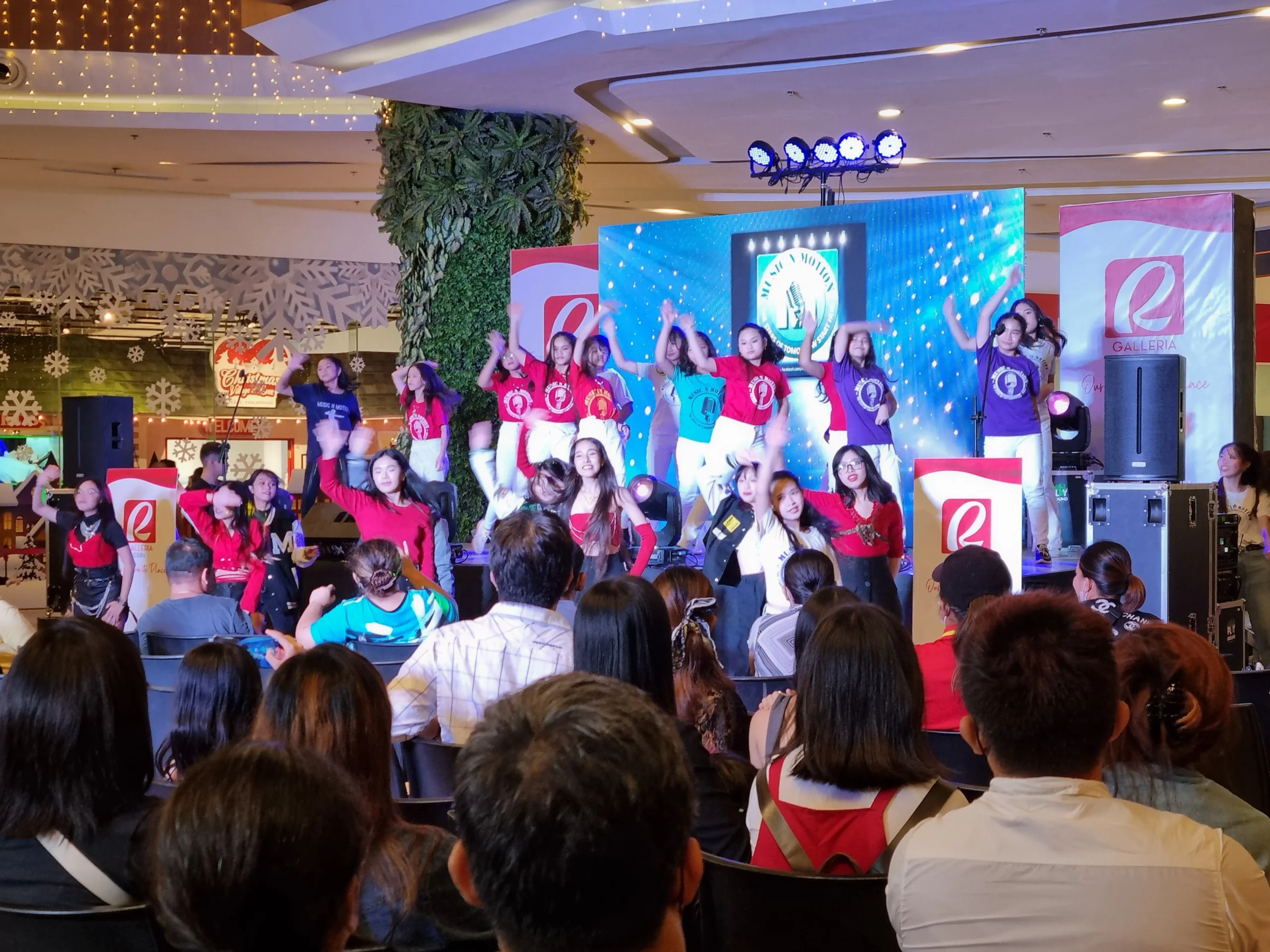 Students performing confidently on stage during a recital at Music N Motion Academy, a music school in Cebu offering voice lessons and real performance experience for kids and beginners.